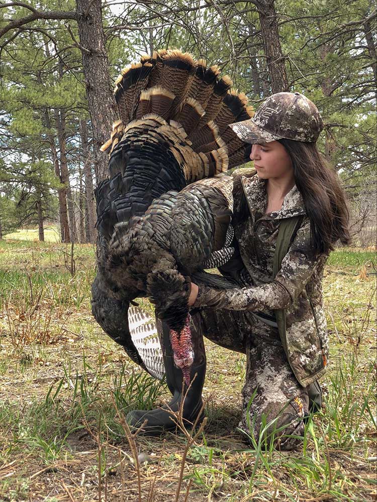 Female-campfire-collective-turkey-hunter-after-successful-hunt