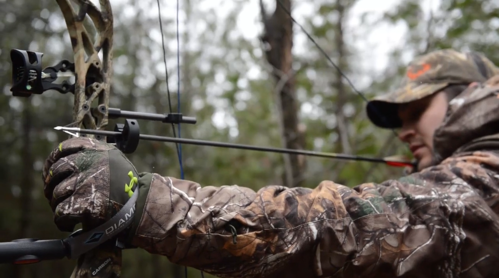 bow-hunter-drawing-bow bow-hunter-drawing-bow